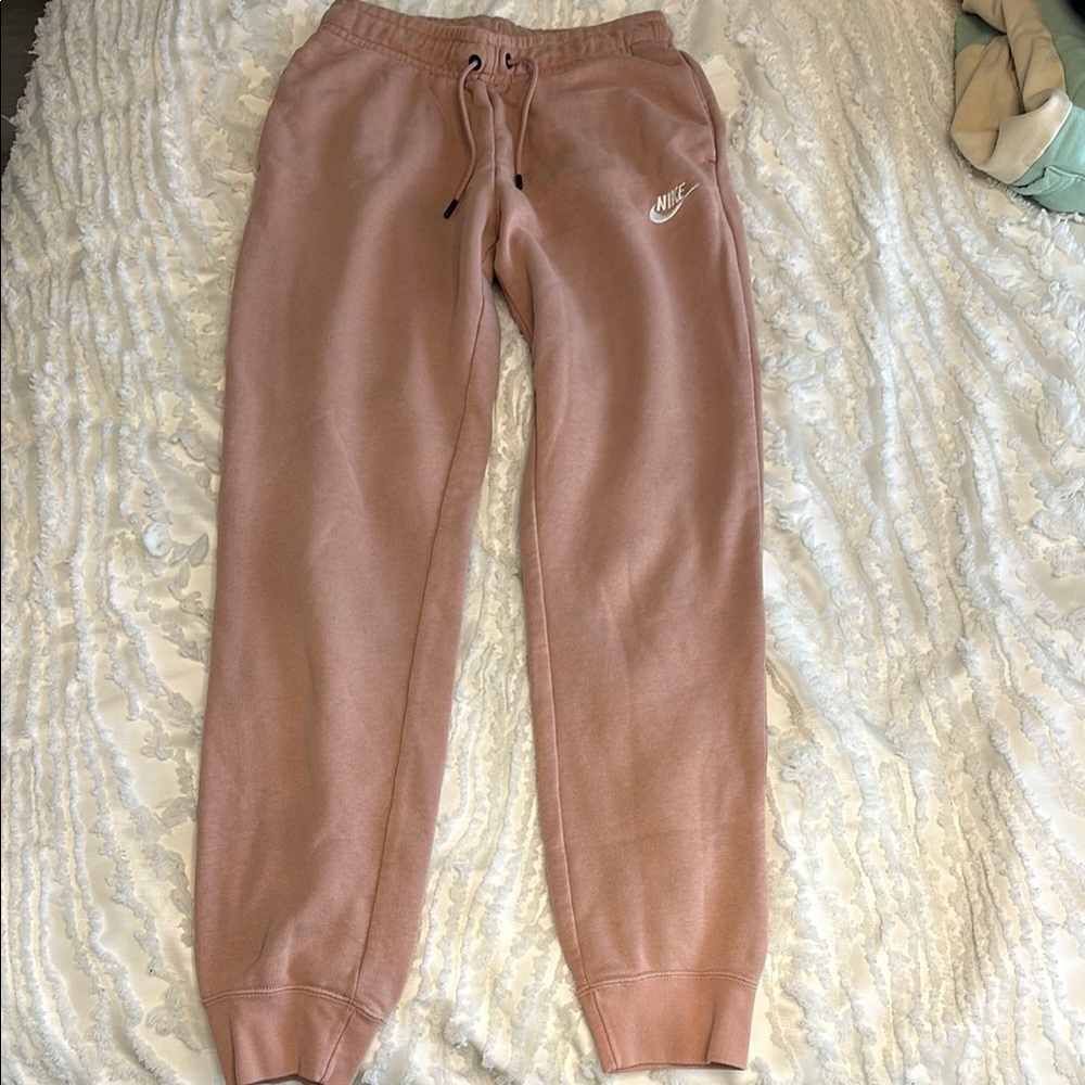 Nike Pink Track Pants with Elastic Waistband and Tapered Cuffs